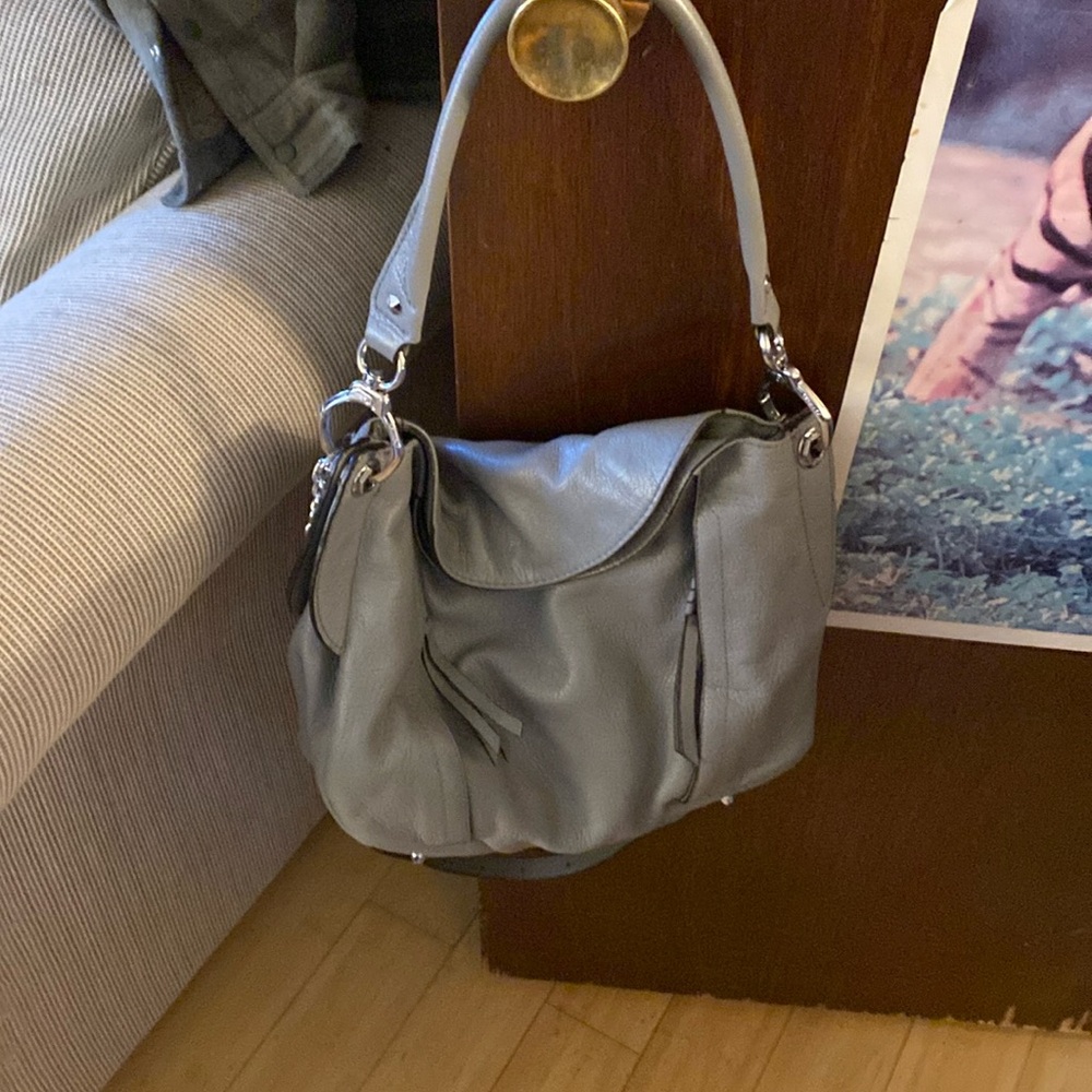ORYANY grey bag zippers in front pocket on pocket in back Excellent condition